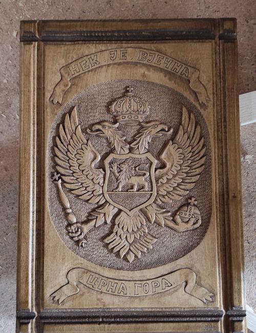 Woodcarving of the Montenegro coat of arms